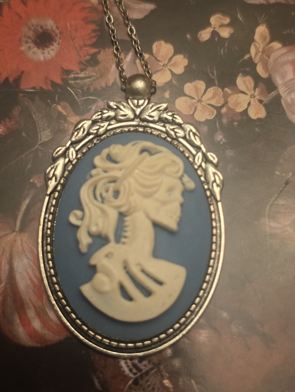 Skeleton Lady Blue Cabochon In Silver Metal Frame On A Stainless Steel Necklace
